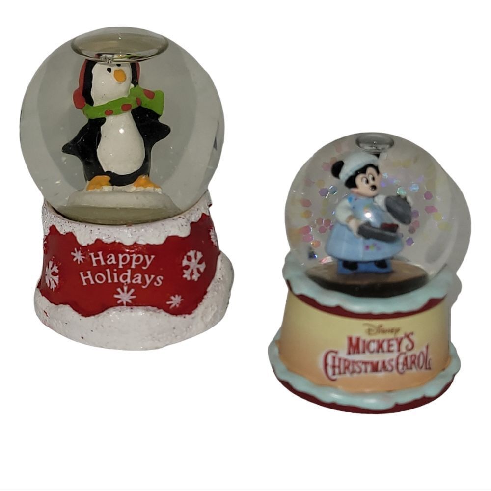 Two mini Christmas snowglobes